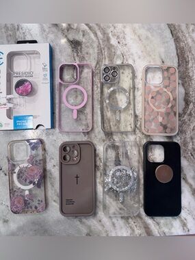 Assorted brands of 8 iPhone 15 Pro Max Cases